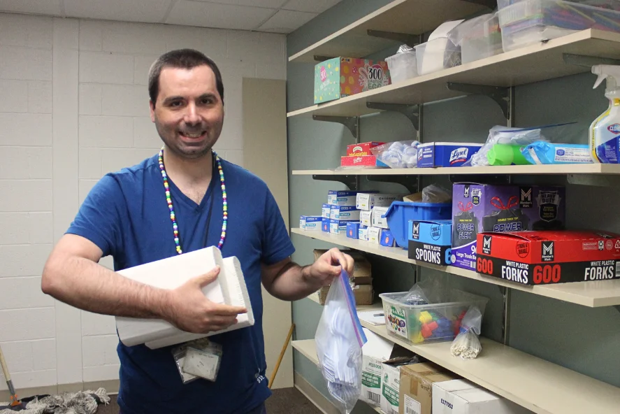 Participant helping distribute supplies